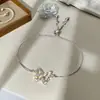 Pulseira Ajustável com Puxador Borboleta Vazada Zircônia Novo Estilo Transfronteiriça para Mulheres, Joia de Pulseira e Tornozeleira Fashion e de Alto Padrão