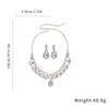 Pendientes de gota de agua con diamantes de circonita de flash súper exagerados europeos y americanos, collar, juego de joyería de diseño nicho, joyería versátil para mujer