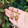 Nuevos Pendientes Retro Europeos y Americanos Mori de Gama Alta Creativos Largos de Madera con Borla de Fruta Seca Natural Estilo Étnico