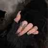 Diseño transfronterizo de alta gama anillo dulce de mariposa líquido para mujer temperamento exagerado anillo abierto dedo índice moda fresco