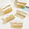 6 pares de aretes de traje estilo europeo y americano dorados retro en forma de C personalidad exagerada geométricos en forma de corazón redondos de retención de color venta al por mayor