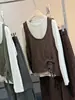 Conjunto de dos piezas para mujer: chaleco de punto sin mangas con cuello redondo calado y cordón, combinado con camiseta de manga larga, top holgado nuevo para principios de otoño