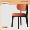 Silla de comedor de madera maciza estilo nórdico italiano, silla de diseñador de lujo ligero para el hogar, silla moderna con respaldo, silla de madera maciza para apartamentos pequeños