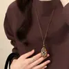 Collar Colgante de Flor de Ojo de Tigre de Madera Retro Cadena para Suéter de Lujo Ligero y de Alta Gama Estilo Étnico Casual Versátil