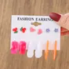 Conjunto de brincos em C de personalidade sobrevendida brincos pequenos de resina colorida coração laço acessórios de ouvido fofos atacado