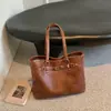 Bolso tote nuevo de 2026, estilo francés, moderno, retro, versátil y práctico, de gran capacidad, adecuado para ir al trabajo; un bolso de hombro o bolso cruzado de gama alta