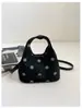Bolso pequeño de mano de felpa y gamuza elegante transfronterizo para mujer, nuevo, textura retro, bolso tipo cubo, nicho, bandolera, bolso cruzado, moderno