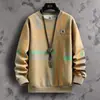 Camiseta a cuadros para hombre con bloques de color de moda, nueva colección otoño/invierno 2026, corte holgado, adelgazante, top casual de manga larga, capa base para hombre