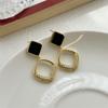 Pendientes de diamantes negros con microincrustaciones explosivas, diseño de nicho, ligeros, elegantes y combinables para mujer.