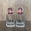 Suministro en stock de botella de vidrio cuadrada de alta gama B119-40ml para perfume, botella vacía de spray rellenable cosmético portátil