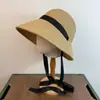 Sombrero de Paja Tejido Nuevo Producto Transfronterizo Alta Calidad Copa Redonda de Atar Estilo Francés Ala Ancha Sombrero de Protección Solar Fábrica Mayorista Sombreros para Mujer