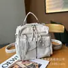 Éxito de verano transfronterizo: 26 modelos nuevos de piel lavada en blanco leche de coco, alto valor estético, gran capacidad, adecuados para el trabajo, bolso de mano, bolso de hombro, bolso cruzado