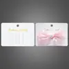 Clip para el cabello de PVC blanco lechoso Tarjeta de plástico Estampado en caliente Impresión 10x7.1cm Clip recto Empaque impermeable Tarjeta de exhibición Papel
