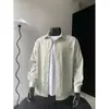 Camisa masculina tendência de cor sólida com mangas compridas, nova coleção de outono, corte solto, inspirada em Hong Kong, peça de outer wear da moda, estilosa e casual.