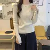 Suéter de punto acanalado vertical adelgazante para mujer, estilo primavera con sutiles aberturas en los puños, un top base de alta gama