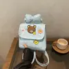 Mochila transfronteiriça fofa temática de urso para estudantes do sexo feminino, mochila externa para meninas de alto valor estético, bolsa de livro de desenho animado para o dia a dia