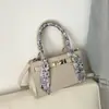 Moda estilo coreano versátil para o dia a dia bolsa Kelly de alta qualidade 2026 nova bolsa de ombro e transversal vintage de nicho