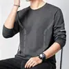 Camiseta de manga larga para hombre, capa interior de otoño para hombre, camiseta base elástica de corte holgado, camiseta estampada estilo coreano ins para hombre