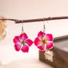 Europa e Estados Unidos estilo de férias de praia transfronteiriço novo brincos de flor de ovo de cerâmica macia dopamina brincos elegantes femininos
