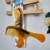 Peine para el cabello con imitación de tendón de res M13 21cm color mixto plástico amarillo para el hogar peine 1 yuan 2 yuanes suministro al por mayor artículos pequeños