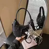 Bolsa Transfronteriza 2026 Nueva Dulce y Linda para Mujer con Lazo, Bolso Cruzado Pequeño, Estilo de Nicho, Bolso Tipo Dumpling de Gama Alta, Bolso de Hombro