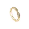Anillo de cuerda retorcida de diseño único con circonita, disponible en oro y plata, accesorio hueco para mujer, joyería al por mayor transfronteriza