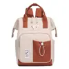 Nova bolsa de maternidade transfronteiriça, bolsa de armazenamento simples multifuncional, grande capacidade, pode ser carregada como bolsa de ombro ou bolsa de mão, mochila feminina moderna