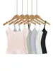 Conjunto de três peças estilo francês: camiseta de manga longa com cardigã de desejo puro + top tipo camisola + saia evasê de cintura alta elástica