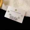 Conjunto de Brincos de Três Peças Flor de Pétala com Bola Totalmente Cravejado Moda Versátil de Alta Qualidade Estilo Francês Brincos Simples de Temperamento de Nicho