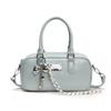 Bolso de bolos de alta gama de color liso para mujer, bolso cruzado de moda 2025, bolso de almohada portátil informal de nicho.