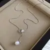 Collar redondo de perlas con cuentas estilo francés, sensación de lujo ligero y alta gama, cadena de suéter de doble capa, accesorio de nicho de diseño único para mujer