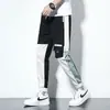 Pantalones cruzados nuevos para hombre, estilo coreano, modernos, corte holgado, estilo ins para estudiantes, pantalones cargo chic casual cortos, marca de moda, con puños en los tobillos