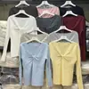 Blusa de tricô com gola V torcida e mangas compridas na cor aveia, estilo coreano, para mulheres, outono e inverno, madura e elegante, design que emagrece, blusa básica