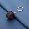 Nuevo llavero colgante de neumático de coche de goma blanda de PVC, accesorios de simulación, modelo de cubo de rueda modificado, llavero de silicona