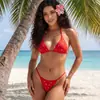 Nuevo estilo de comercio exterior: Bikini retro europeo y americano, sexy, con ojales metálicos, cuello halter y tiras para atar, perfecto para vacaciones en la playa