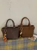 Moda Transfronteriza 2026 Diseño de Nicho Bolso Cubo Nuevo para Mujer Bolso de Hombro Versátil Simple Retro para Mujer