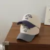 Gorra de béisbol de dos tonos con visera curva, gorra de dibujos animados con pico de pato, adecuada para estudiantes y parejas para el uso diario