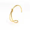 Nuevo pulsera de titanio de estilo frío ins de nicho de Corea del Sur, pulsera de titanio de acero con nudos irregulares, joyería de mano simple de moda