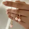 Nuevo Collar con Colgante de Perla y Aretes traje Moda de Lujo Ligero traje Combinación Total Joyería Exquisita de Recuerdo en stock Venta al por Mayor