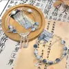Pulseira de Borla com Pincel de Porcelana Azul e Branca Xiaohongshu Estilo Antigo para Mulheres, Design de Nicho, Novo Estilo Chinês, Paz e Fortuna
