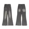 Jiamu Entra en Escena para Probar Jeans Baggy Americanos Retro Bigotes Desgastados Borde Crudo Ligeramente Acampanados Jeans Unisex para Hombres
