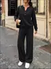 Moda Feminina Cruzada Europeia e Americana Outono e Inverno 2026 Novo Conjunto Casual Esportivo de Duas Peças: Blusa Solta de Manga Longa e Calça de Barra Larga