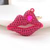 Llavero de coche con pintura de labios nueva de estilo europeo y americano, colgante de metal con bolsa de diamantes de Yiwu