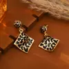 Falda de Moda con Estampado de Leopardo, Aretes en Forma de Corazón, Estilo Vintage Dorado, Joyería Transfronteriza Creativa Clásica de Nicho