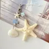 Llavero Colgante Creativo de Concha Marina Estrella de Mar Colgante para Mochila Cadena para Teléfono Colgante de Pareja Regalo
