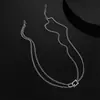 Collar de acero inoxidable con hebilla de doble capa transfronteriza para hombres y mujeres, tendencia que no se decolora, cadena para clavícula de alto sentido Joker, fabricantes