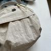 2025 Nuevo Bolso Redondo Pequeño de Otoño e Invierno Bolso para Teléfono Móvil Bolso de Hombro Único Cruzado Bolso de Hombro Pequeño de Tela de Nylon para Mujer Moda Versátil