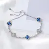 Pulsera de Trébol de Cuatro Hojas de Zirconia Estilo Dulce para Niñas, Exquisita y de Lujo Ligero Diseño de Nicho Pulsera, Accesorio de Mano de Moda y Versátil