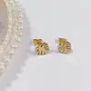 Aretes de Tuerca Geométricos de Estrella de Acero Titanio con Bolas de Acero Grandes y Pequeñas de Moda Simple al por Mayor de Fábrica de Venta Caliente Aretes Perforados Mujeres