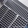 Fabricante de Almohadillas de Silicona Redondas Irregulares con Rejilla Adhesiva Negra Anti-Colisión Amortiguadoras Resistentes al Desgaste para Muebles, Patas de Goma Autoadhesivas